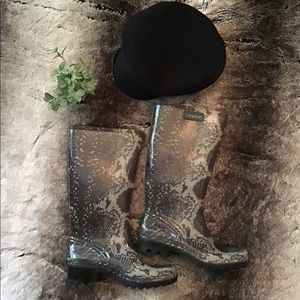 Calvin Klein snake print rubber boots